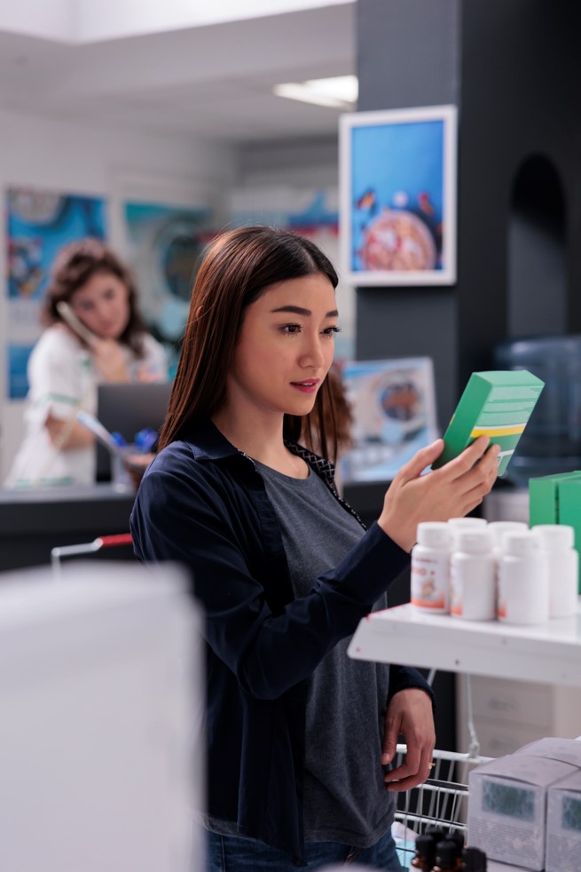 A girl shopping at a pharmacy