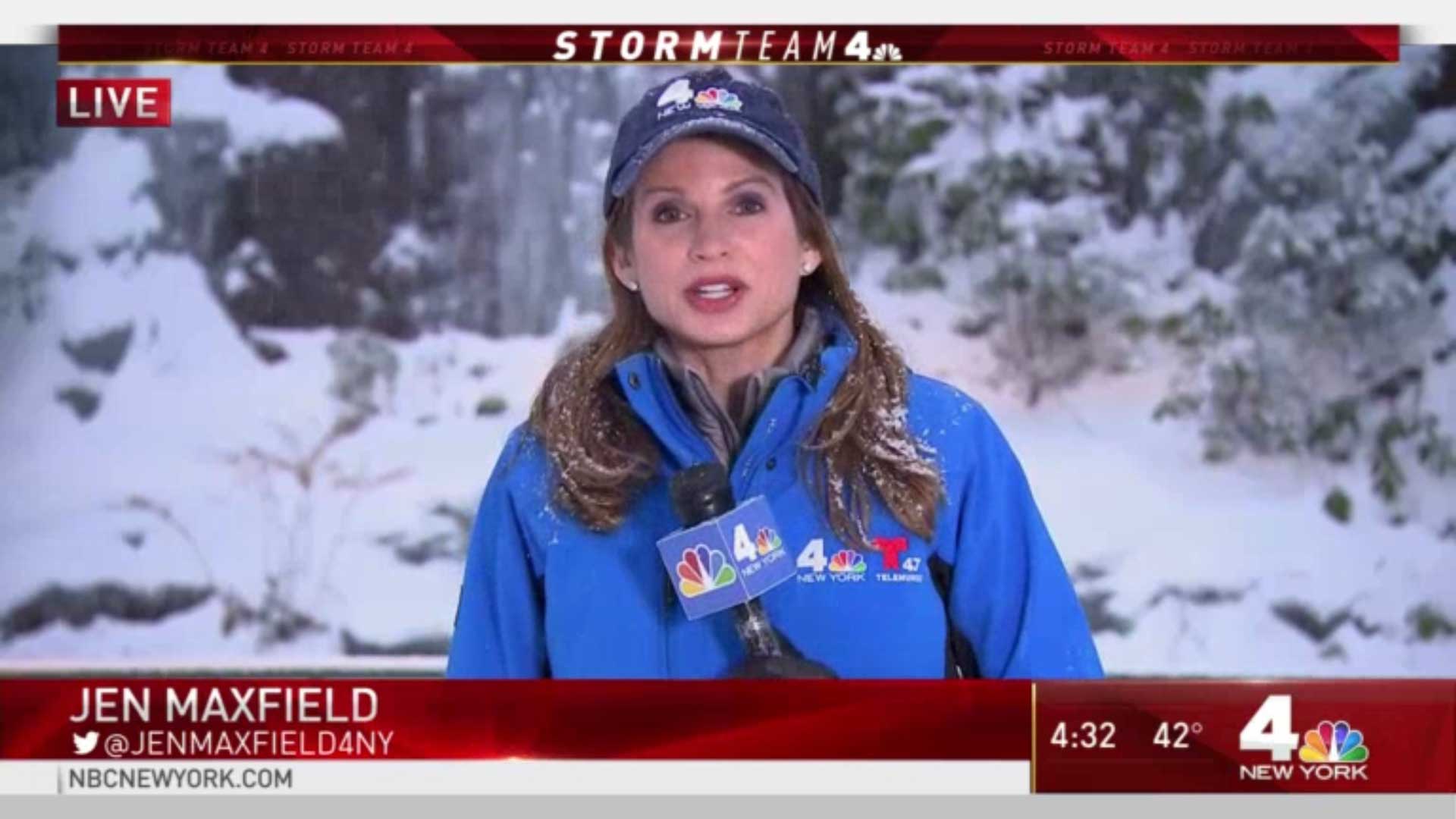 Jen in the field reporting on a winter snow storm.